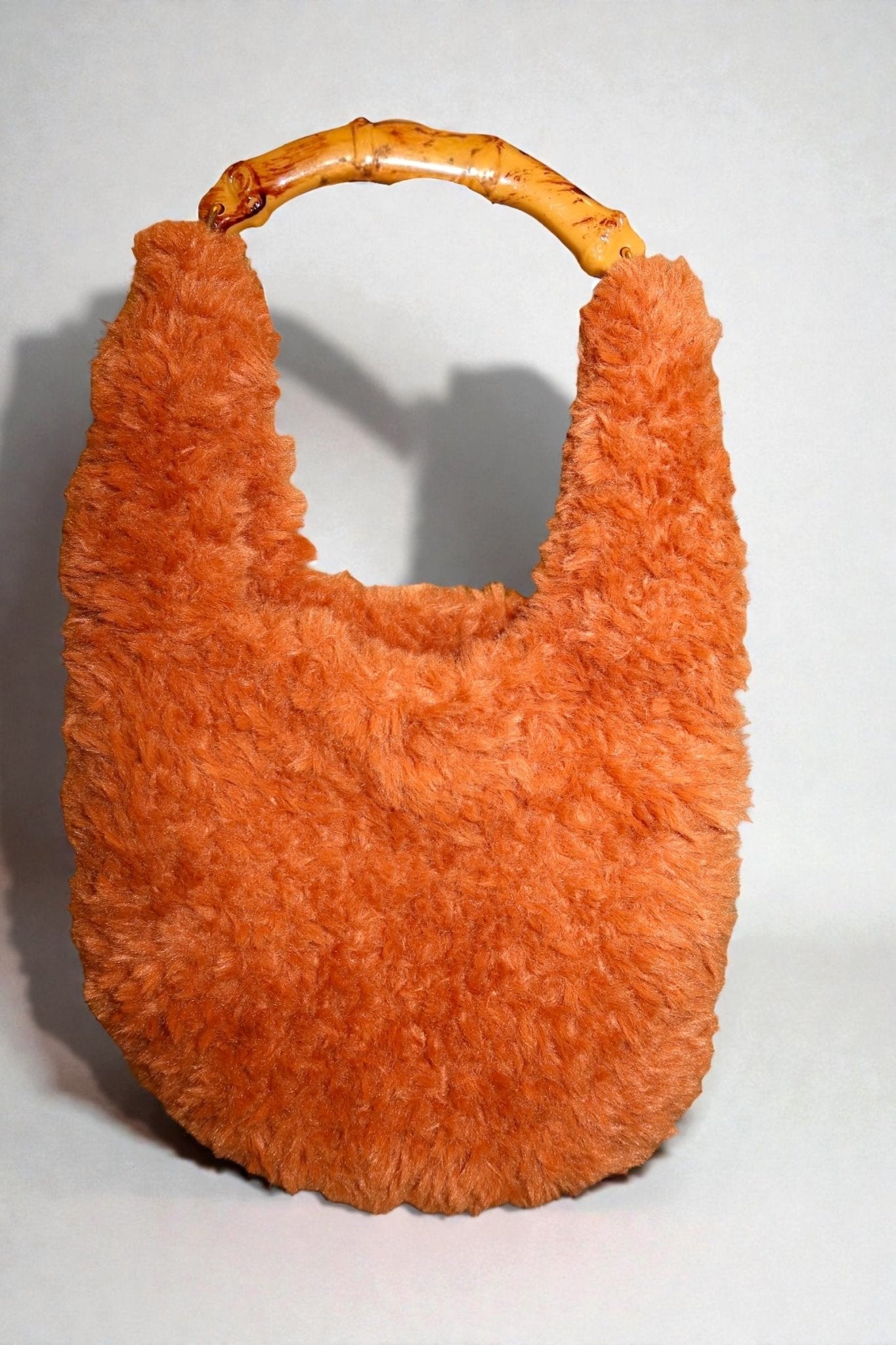 Bamboo Muse fur and crochet bag with bamboo handle made in Italy