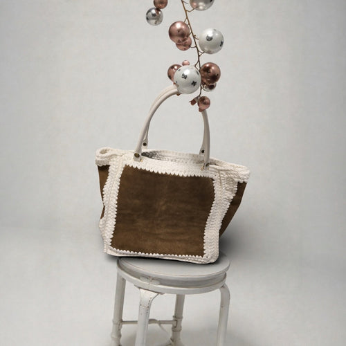Cowboy Muse handcrafted suede and crochet bag detail